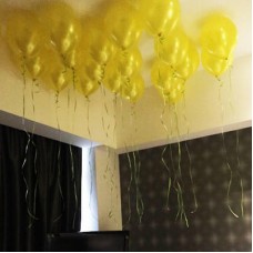 Yellow Helium Balloon Flout To Ceiling 